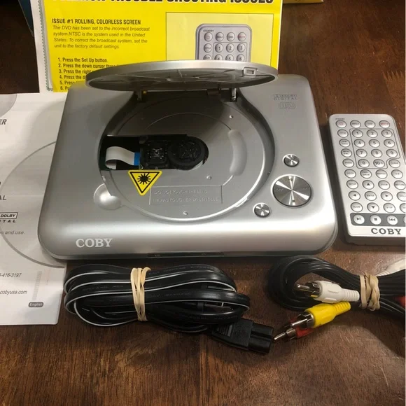 Coby DVD Player Ultra Compact DVD 209 Top Loading With Remote Control - Av Cable